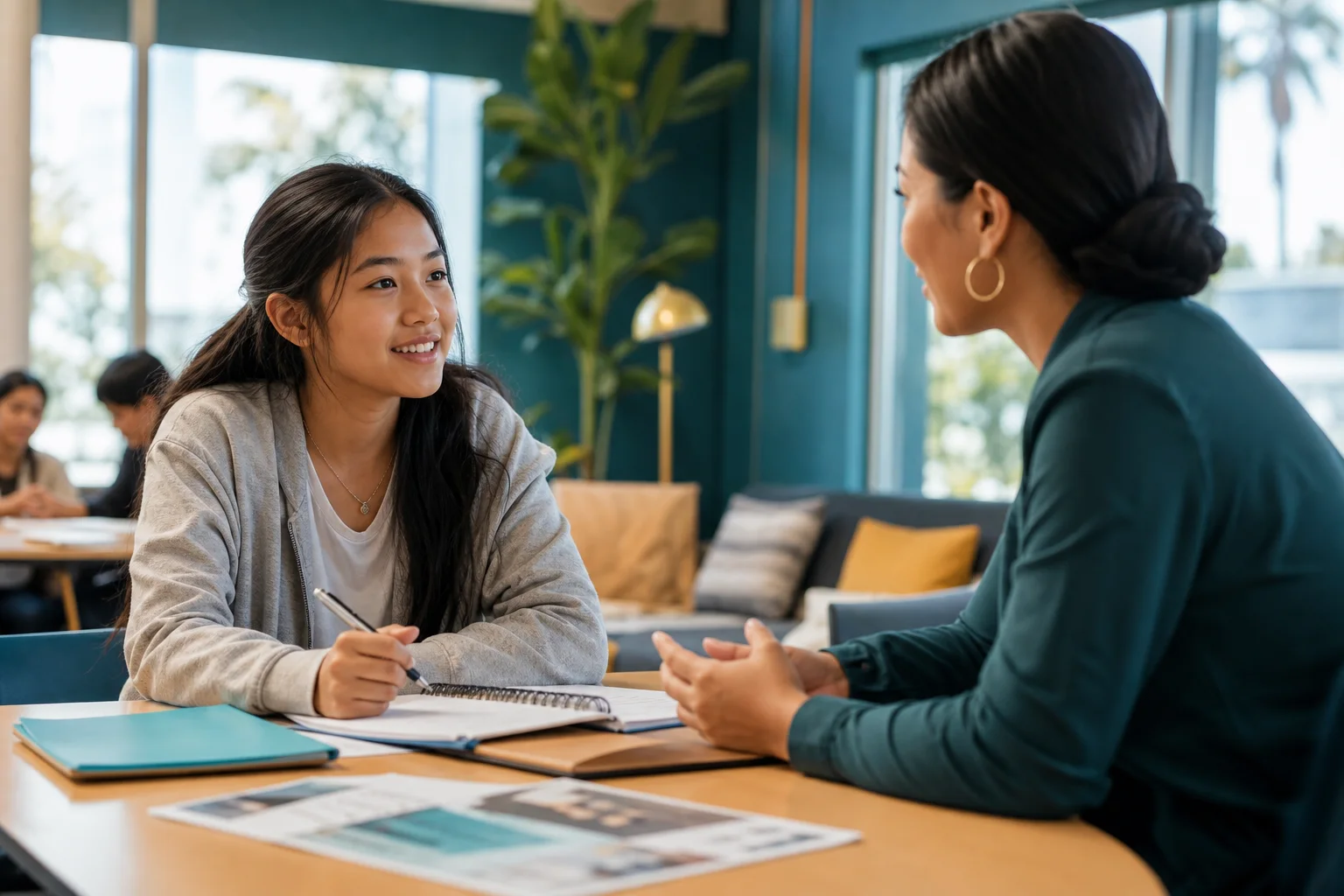 A Southeast Asian student practicing career planning with a mentor