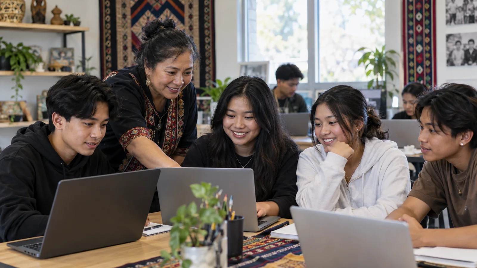 Southeast Asian youth learning AI and digital workforce skills with a community mentor